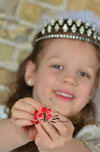 Illustration for article titled Great Idea for Your Small Baby: Buy Her a 'Future Bride' Photoshoot